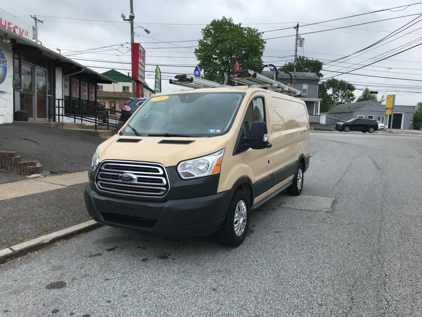 2017 Tan /Gray Ford Transit 150 (1FTYE1YM0HK) with an 3.7 V6 engine, Automatic transmission, located at 577 Chester Pike, Prospect Park, PA, 19076, (610) 237-1015, 39.886154, -75.302338 - Photo#2